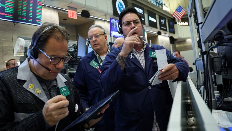 Stocks rebound and Dow closes above 47,000 for the first time after colder-than-expected inflation report