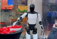 Tesla's Optimus robot distributes candy in Times Square